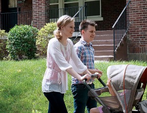 Chris and Ashley Paavola prayer-walk through University City, Mo., letting God lead their steps, June 12, 2015.